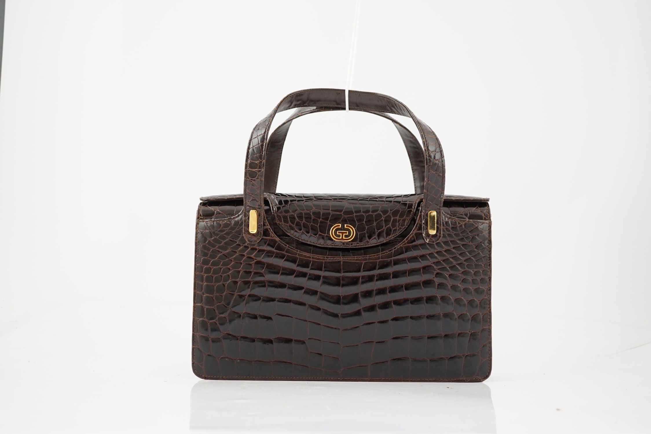 A lady's vintage brown crocodile handbag height 20cm, height to handles 33cm, width 32cm, depth 6cm